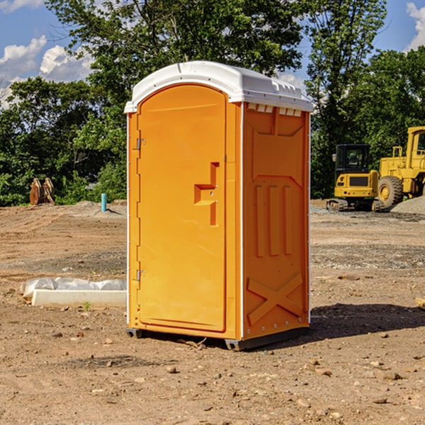 what is the cost difference between standard and deluxe portable restroom rentals in Clay County